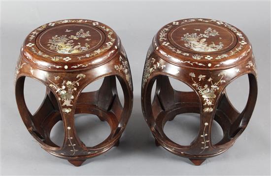 A pair of Chinese hardwood and mother of pearl inlaid stools, H.46cm Diameter 39cm